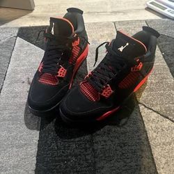 Red Thunder Jordan 4's