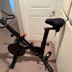 Like-New Exercise Bike w/  Extra Seat Pad