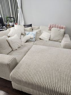 Ashley Furniture Lindyn Ivory 4-Piece Sectional Couch