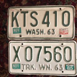 Vintage 1963, one for a truck and one for a sedan