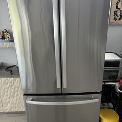 General Electric three door refrigerator