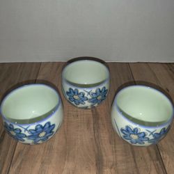 Vintage Asian Blue Flower Pattern Sake Tea Cup Set Of 3. One has a small chip shown in pictures. Sold as is.