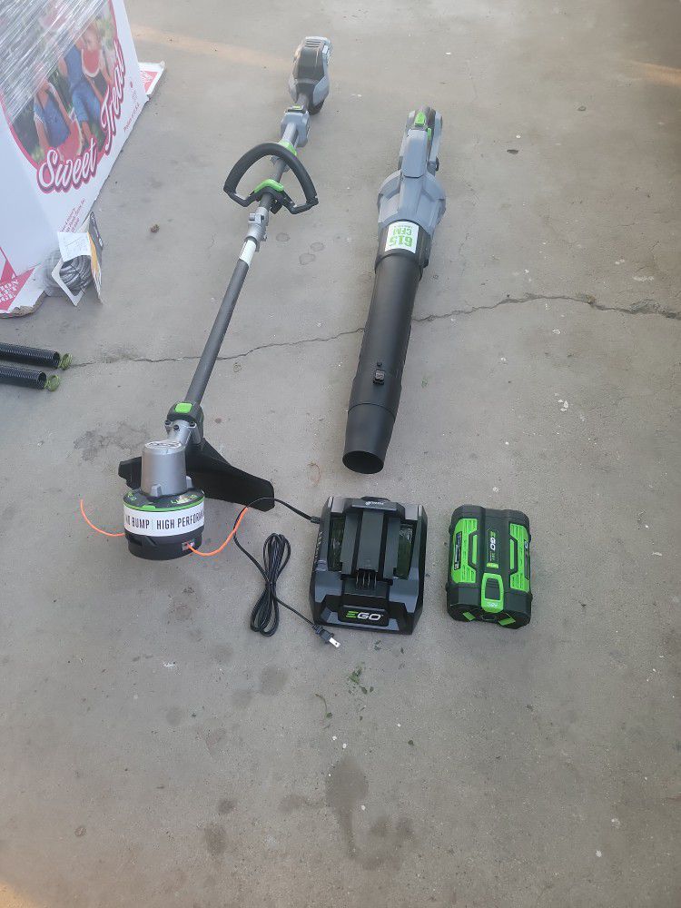 EGO POWER + 56-VOLT CORDLESS BATTERY STRING TRIMMER AND LEAF BLOWER COMBO KIT 2.5 AH BATTERY AND CHARGER INCLUDED 