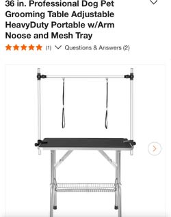 Dog grooming table