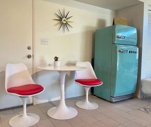 4 red tulip chairs mid century