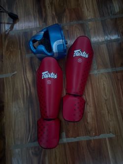 Fairtex shinguards and sanabul headgear