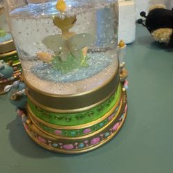 Disney Tinker Bell snow globe that also functions as a Christmas stocking holder