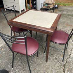Nice Folding Table With 4 Leather Chairs 