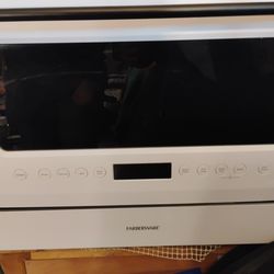 Farberware Professional 6 Place Setting Countertop Dishwasher with Glass Door. FCD06ASWWHC. Only Used A Couple Times. Works Great. No Problems.
