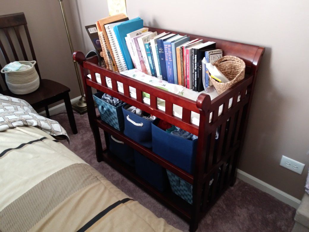 Sleigh changing table