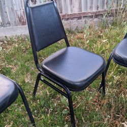 4 Black Chairs Stackable Cushion Metal 
