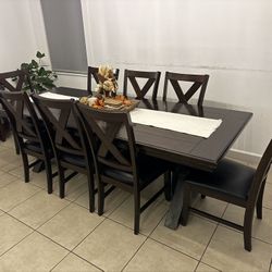 Brown Table With 8 Chairs