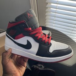 Nike Black And Red Air Jordan 1s Mid