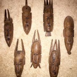 Vintage  hand carved Iron Wood (?) masks 