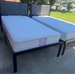 Two nice twins beds with mattress $150 each or 2 for $300