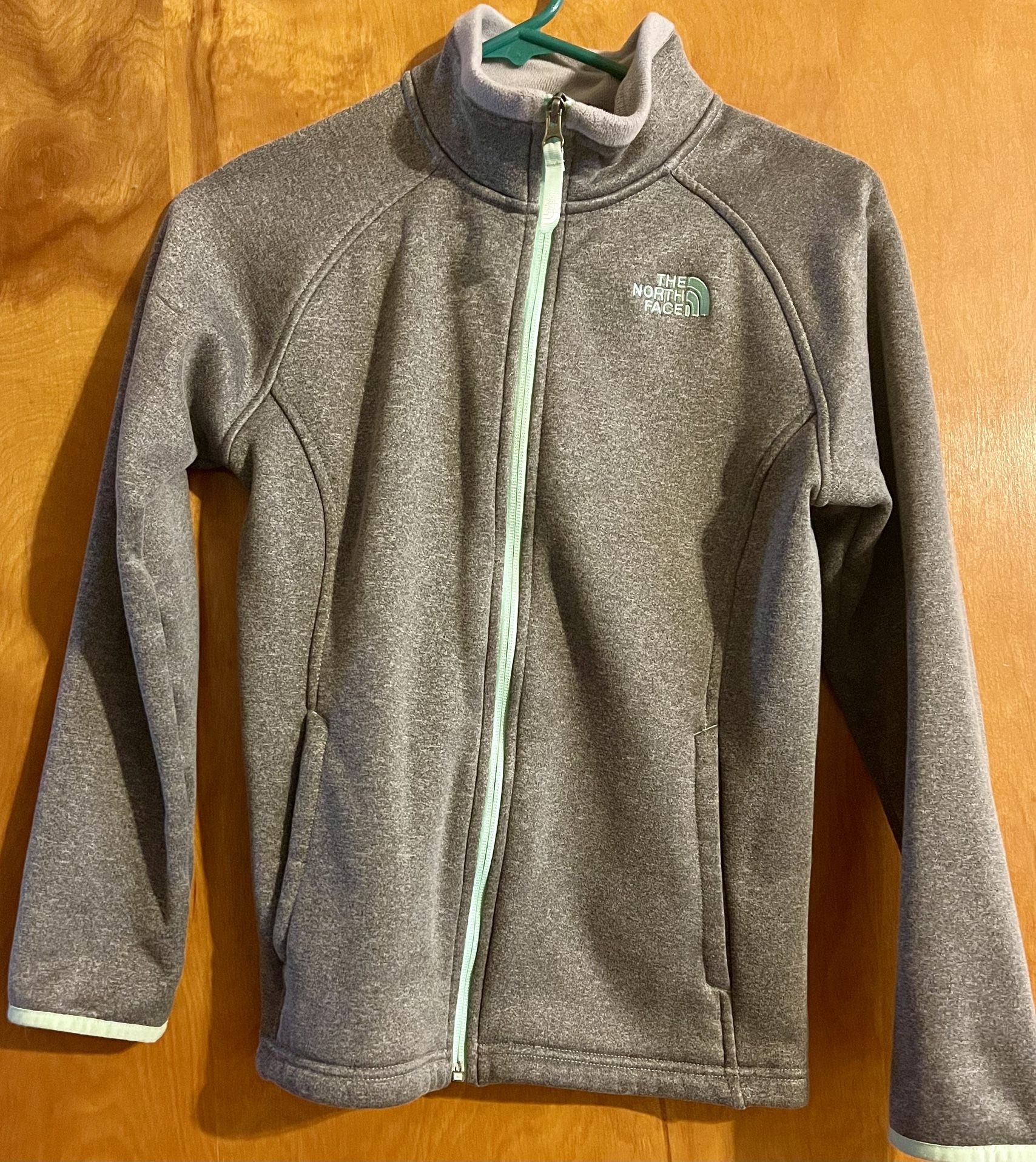 The North Face Youth XL (14/16) Gray Jacket With Blue Zipper.