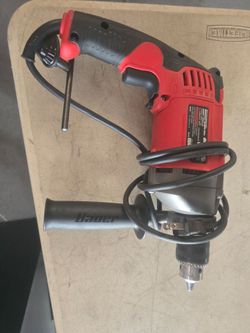 Reversible hammer drill