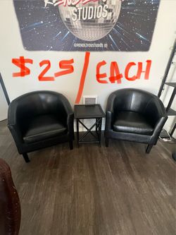 Faux leather bucket chairs