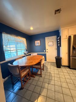 Wood Kitchen Dining Table + 4 Rolling Chairs