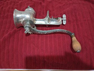 Collectable "Universal" Brand Grinder