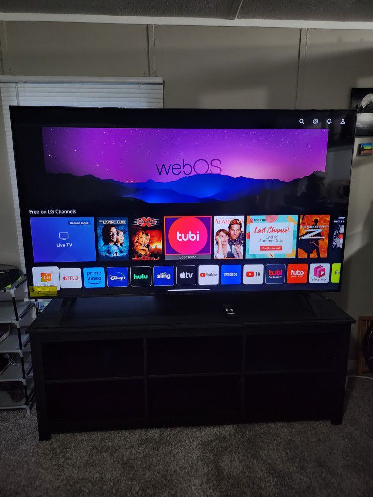 75 Inch LG TV With Black Stand 