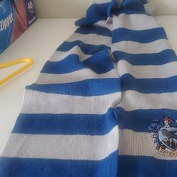 The Harry Potter Ravenclaw Scarf is a stylish unisex accessory inspired by the iconic wizarding world