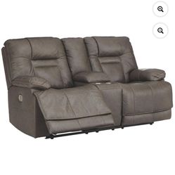 Signature Design by Ashley Wurstrow Leather Power Reclining Loveseat in Smoke New 995$ Pick up 43rd ave and Indian School 