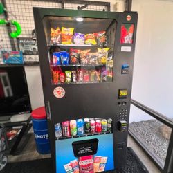 Compact Combo Vending Machine With A Credit Card Reader Installed 