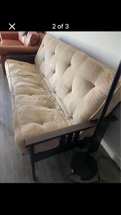 Very comfortable thick mattress futon with a wooden frame
