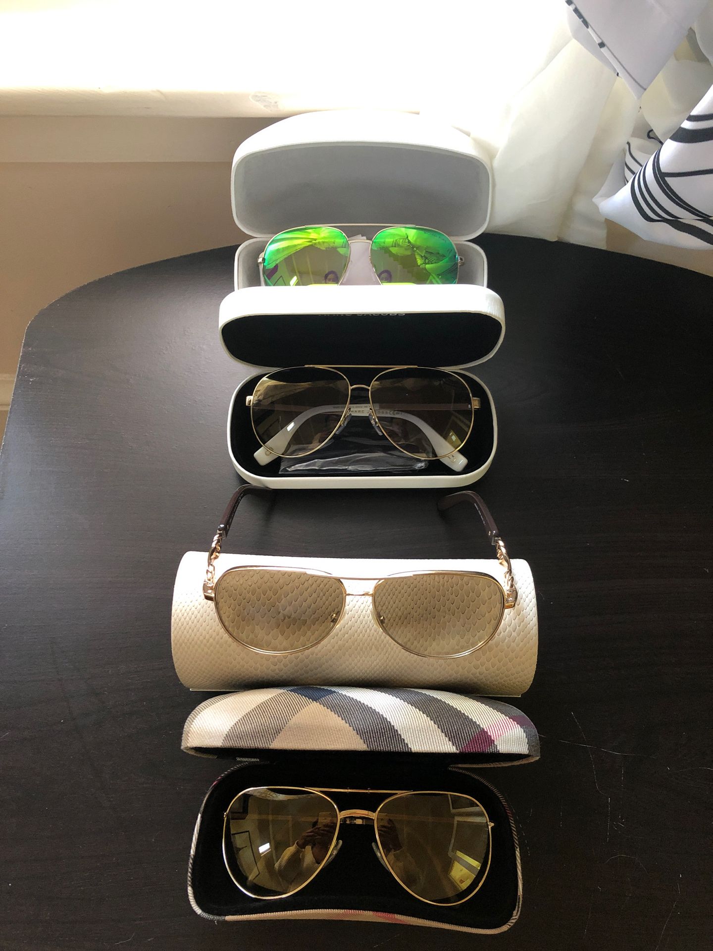 Michael Kors, Marc Jacobs, Burberry, and Jimmy Choo Aviators