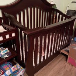 Crib, Changing table And Dresser Set. Color Is Mahogany 