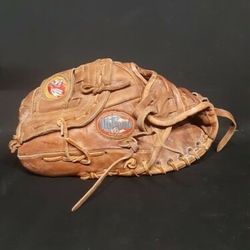Nokona 11 inch infielders glove, left hand throw. 