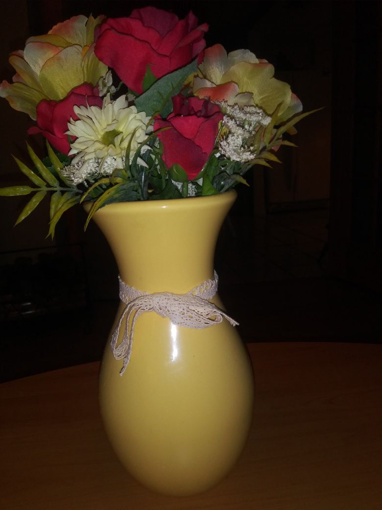 Flowers with yellow vase