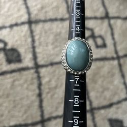 Green and silver ring