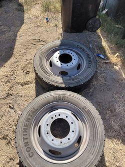 Selling a set of 10 lug rims & tires from a chevy truck