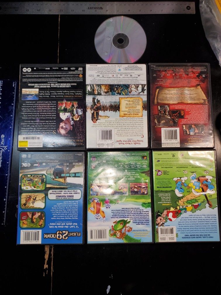 6 DVDs 1 PC Game  Once Upon a Forest, Pirates of the Caribbean: The Curse of the Black Pearl