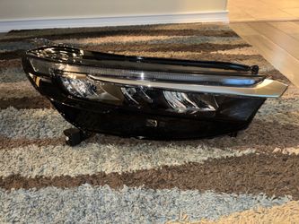 Silver Honda accord passenger headlight