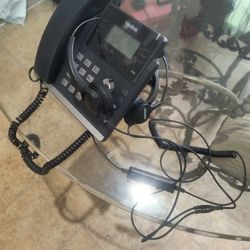 Yealink business desk phone with headset