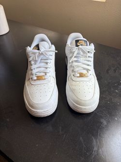 Women’s Nike Air Force 1s “white and black”