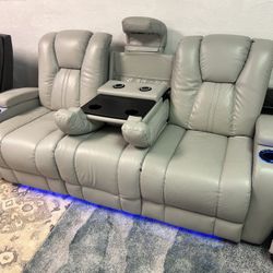 Like New Leather Electric Dual Reclining Couch With Electric Headrests And Dual USB 