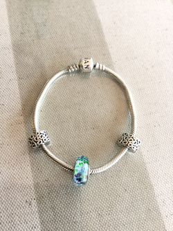 1 Pandora 7.25” Bracelet With 1 Charm and 2 clips