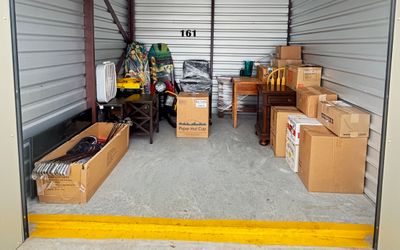 Auction Unit 161 12/14 - Books, Boxes, Chair, CD DVDs, Clothing And Shoes, Furniture, Lamp