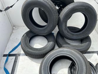 Eje con frenos para trailas, rines, llantas nuevas. Trailer axle with brakes, rims, and tires are brand new