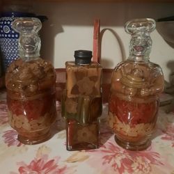 SEALED - 3 Bottles Pepper/Spice Infused Oil $50 for All. (The 2 bottles on the sides are 12" Tall & Middle one is 9" Tall)
