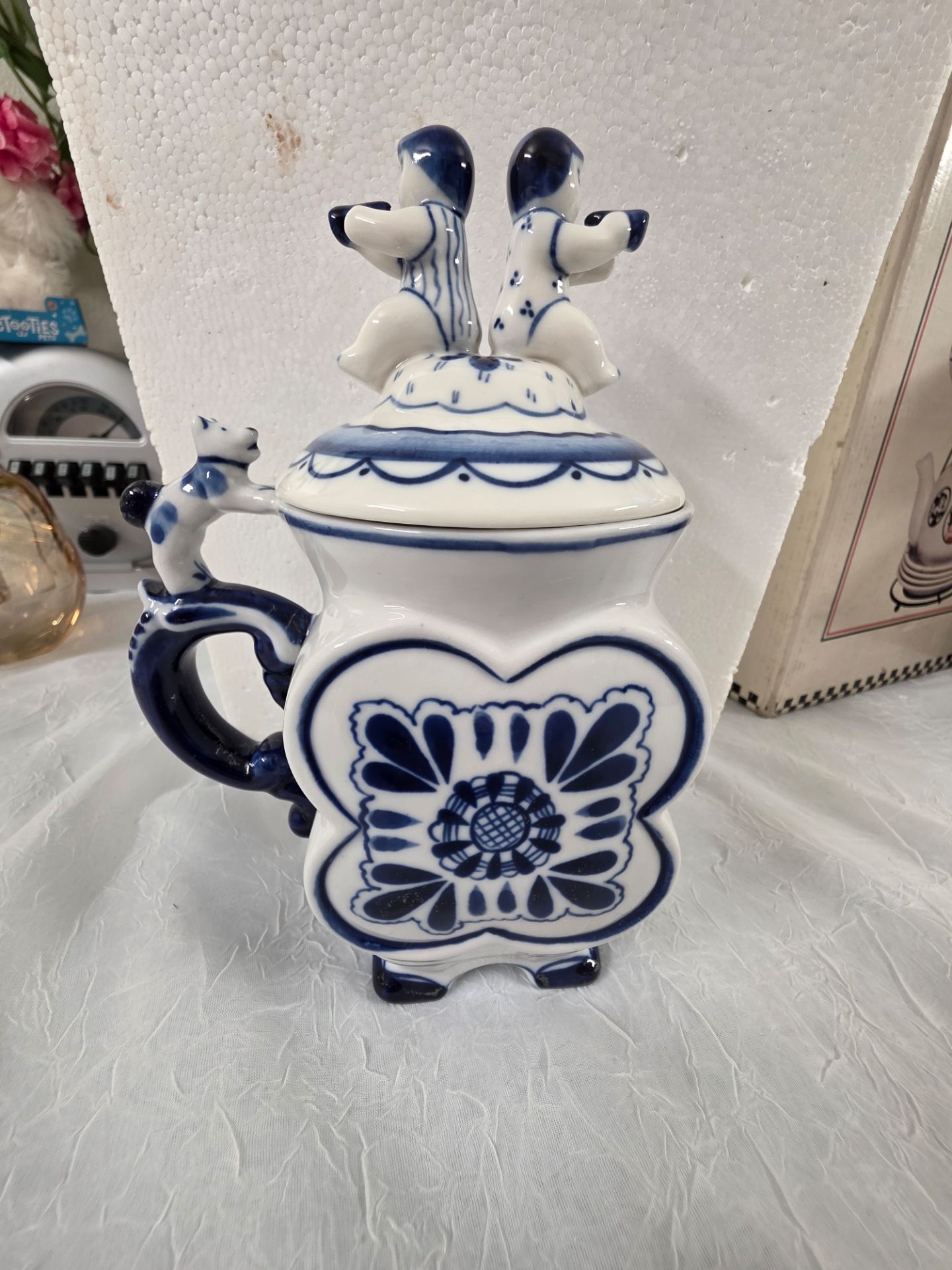 Hand-painted Gzhel porcelain lidded stein in cobalt blue and white, stamped "Hand Made in Russia" on the base. Acquired in Russia circa 2001. Quatrefo