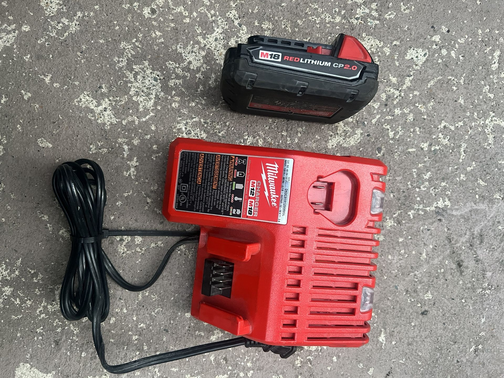 Milwaukee Battery And Charger