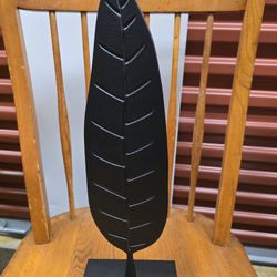 The Ikea LINDRANDE Decoration Metal Textured Leaf in black is a stylish and modern decorative piece for any room. This 17 3/4" tall leaf ornament is m