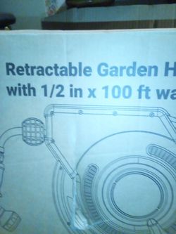 Retractable garden hose reel with 1/2   by ,100 ft. Water hose