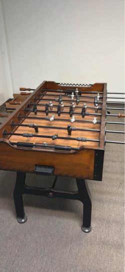 Foosball Table with Wood Cabinet paid $800 for it