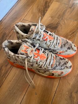 Puma Clyde Court 2.0 sneakers in US 13. Camouflage with orange accents.